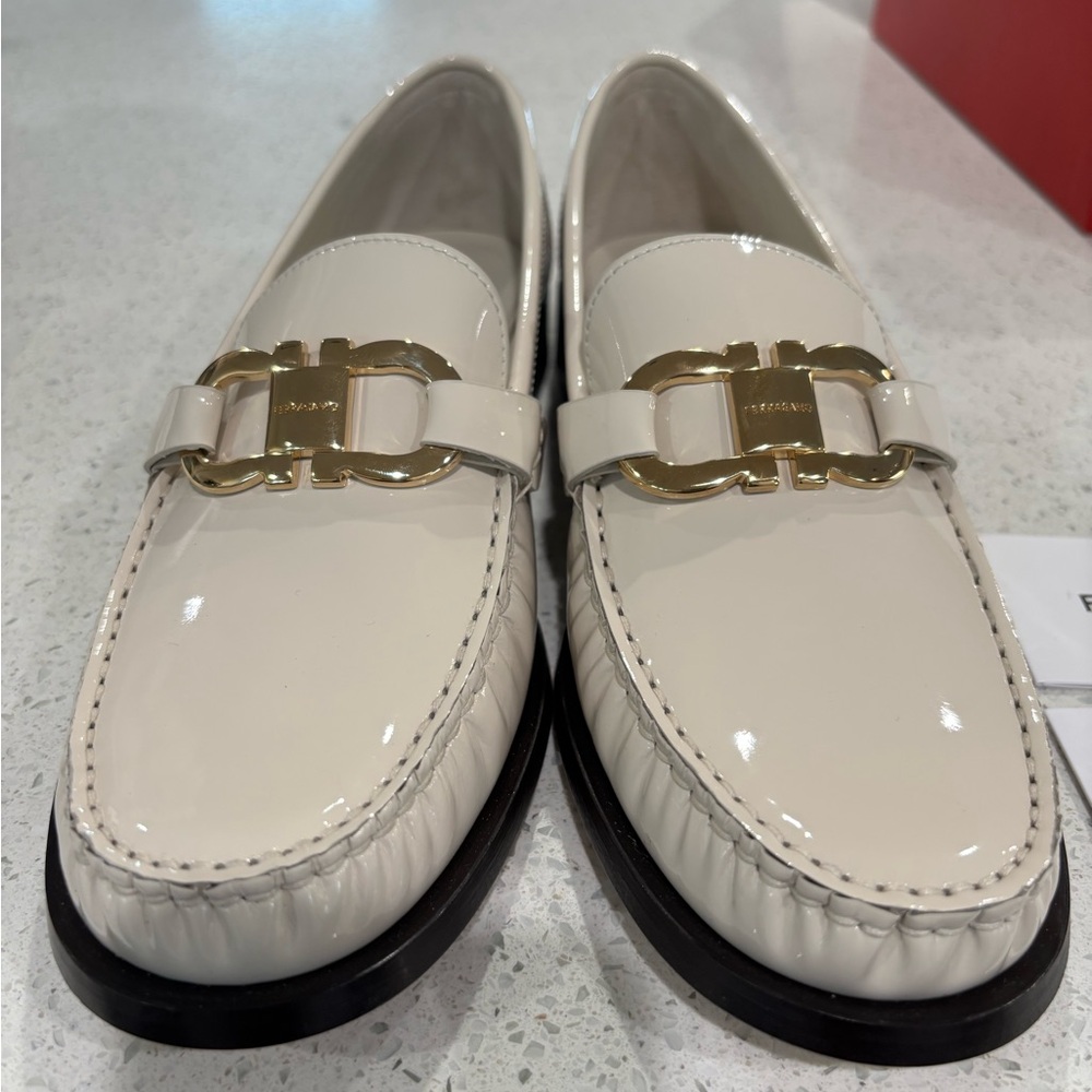 Beautiful Ferragamo Maryan patent off white/ ivory loafers.